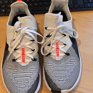 Nike Free Women Athletic Shoes with Black White W/ Orange Accents Size 9.5